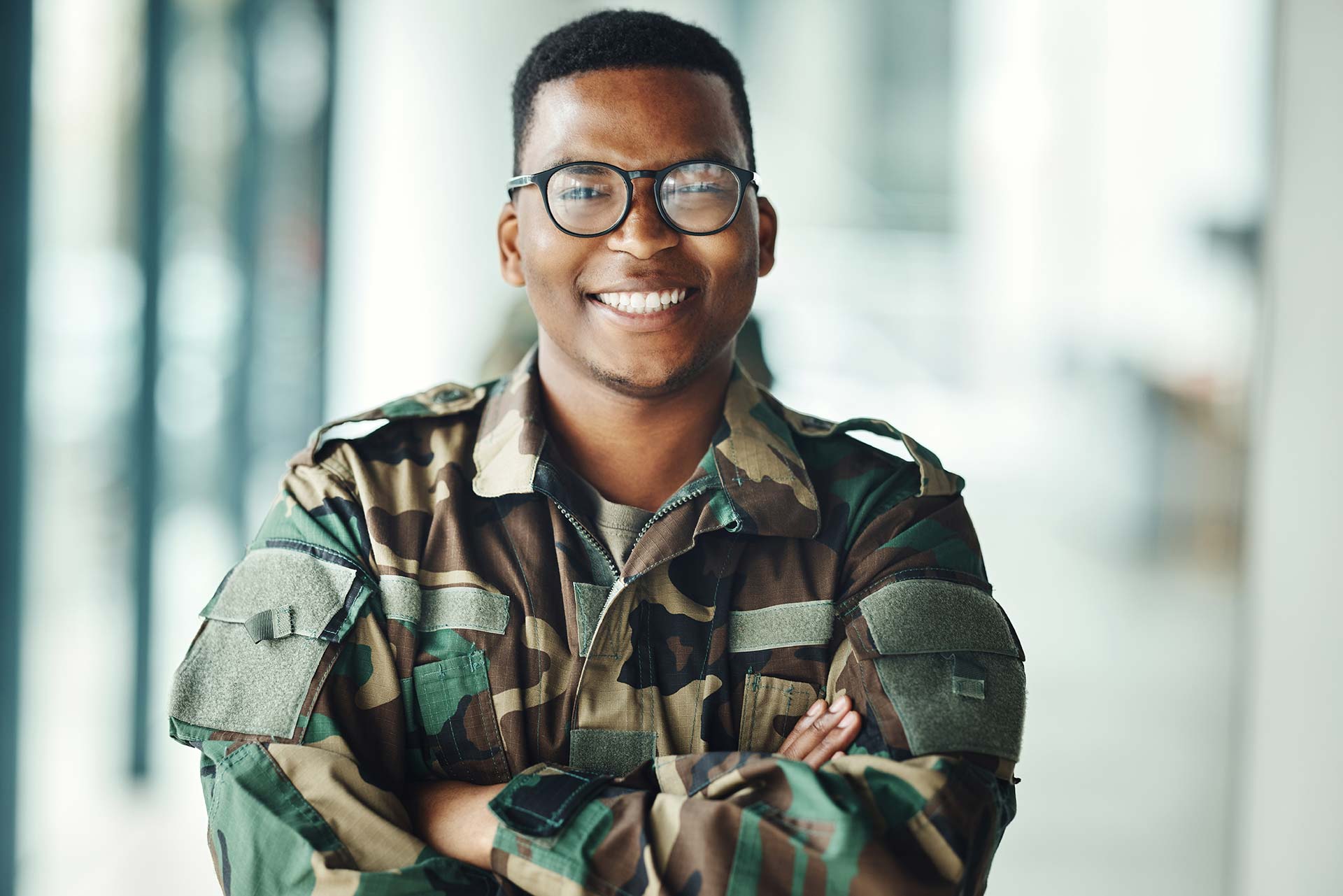 Man in a military uniform smiling